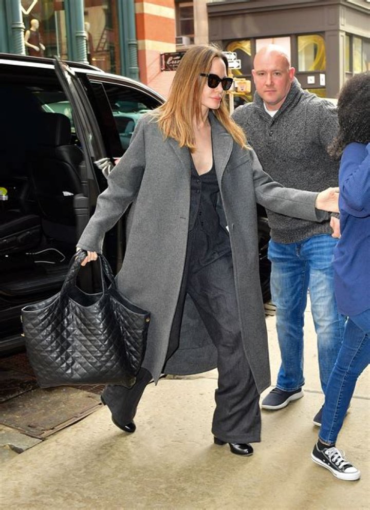 Angelina Jolie got some new ink on her middle finger while she was in NYC