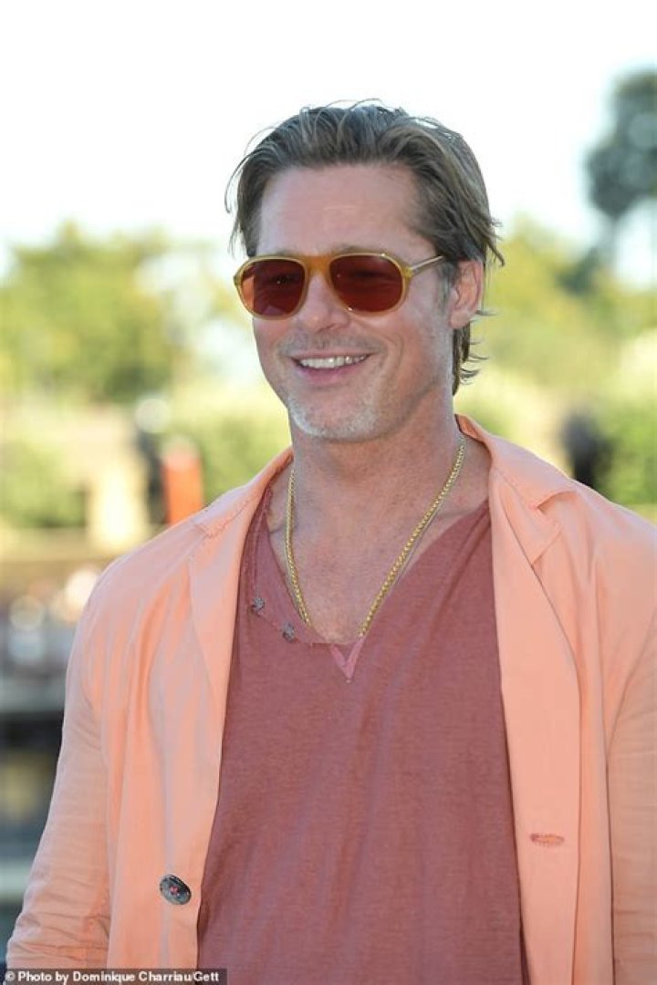 Brad Pitt wore an awful orange suit at the Paris ‘Bullet Train’ photocall