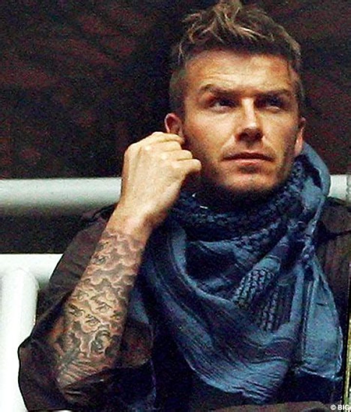 David Beckham gets naked Posh tattoo
