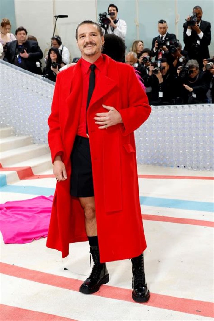 Jeremy Pope slayed in a 33 foot train featuring Karl Lagerfeld’s face at the Met Gala
