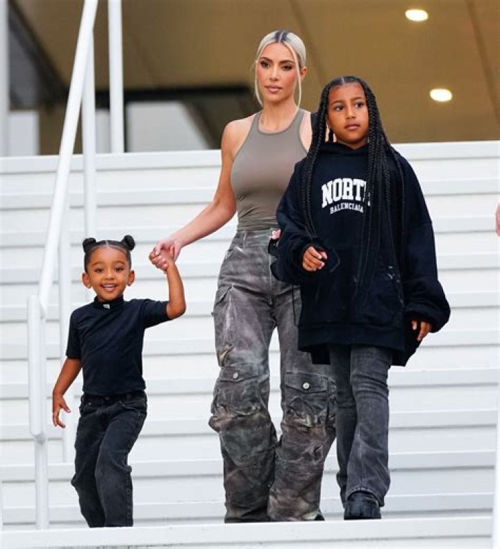 Kanye West puts Kim Kardashian on blast over their kids' school - as fans beg 'just text her bro'