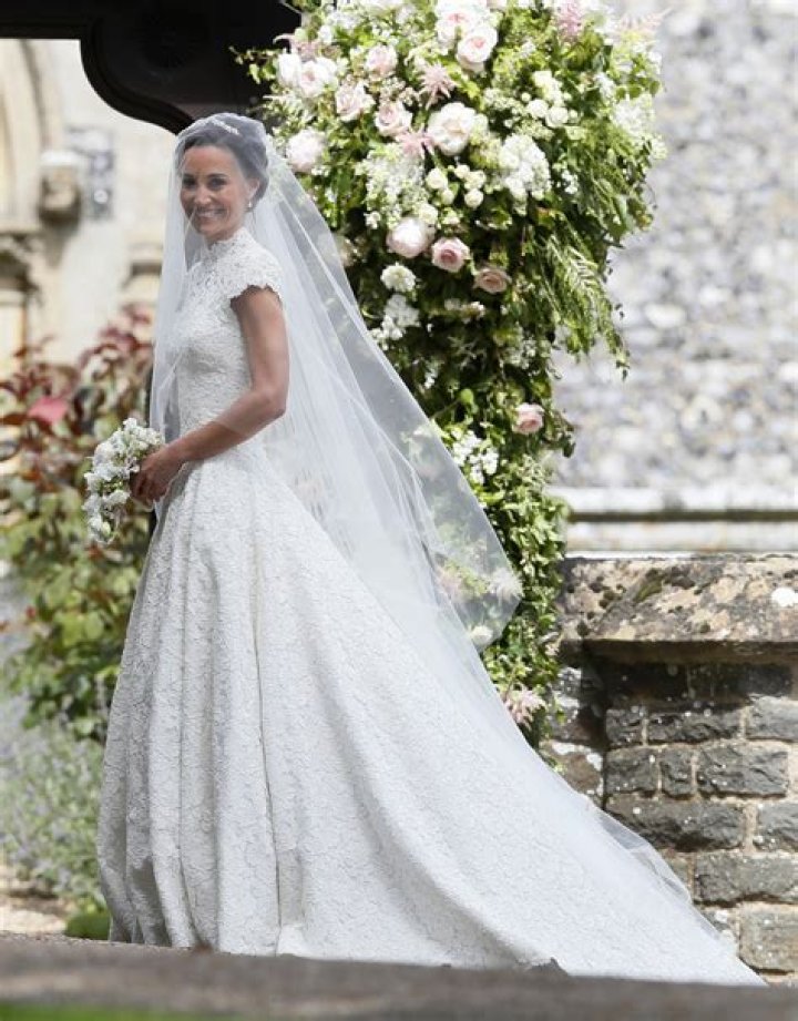 Pippa Middleton wore a lacy, high-necked Giles Deacon wedding gown