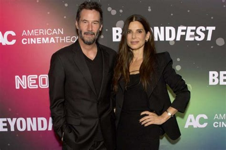 Sandra Bullock is leaning on old friends Keanu Reeves & Hugh Grant